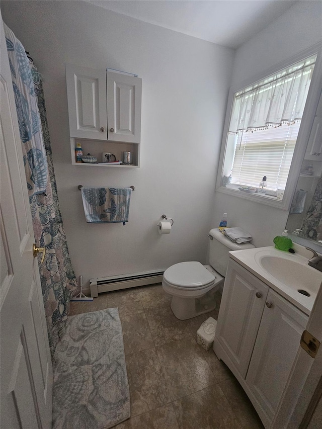 274 N Grand Ave, Poughkeepsie, NY 12603 - full bath with baseboard heating and vanity