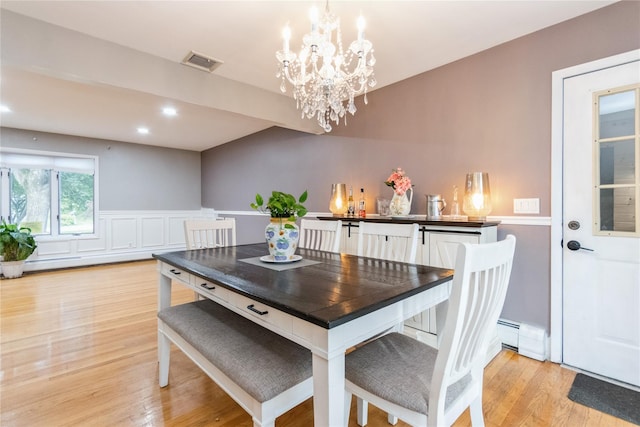 46 Laffin Ln, Poughkeepsie, NY 12603 - dining area with a chandelier, light wood-type flooring, recessed lighting, baseboard heating, and a wainscoted wall