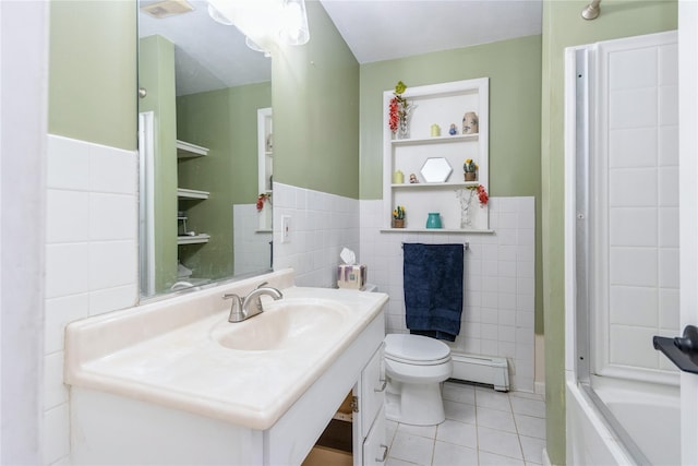 46 Laffin Ln, Poughkeepsie, NY 12603 - bathroom featuring baseboard heating, tile walls, tile patterned flooring, vanity, and a wainscoted wall