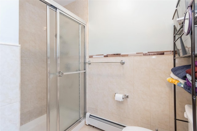 46 Laffin Ln, Poughkeepsie, NY 12603 - full bathroom with a baseboard radiator, a stall shower, and tile walls