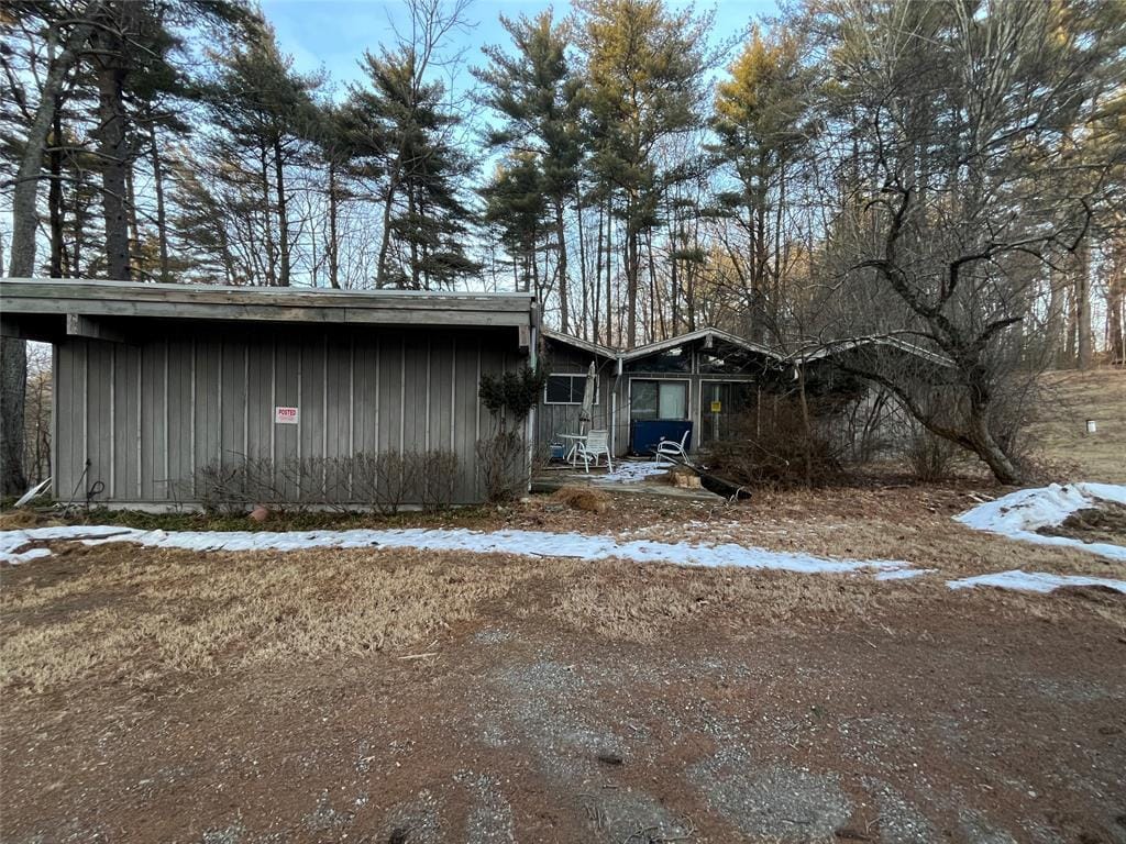 966 S Anson Rd, Stanfordville, NY 12581 - view of snow covered exterior with board and batten siding