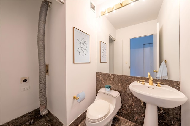 200 Riverside Blvd Unit 10C, New York Manhattan, NY 10069 - bathroom featuring toilet and marble finish flooring