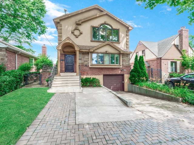 165-05 67th Ave, Fresh Meadows, NY 11365 - view of front of home with decorative driveway, stucco siding, a garage, and brick siding