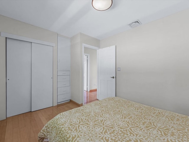 165-05 67th Ave, Fresh Meadows, NY 11365 - bedroom featuring light wood-style floors and a closet