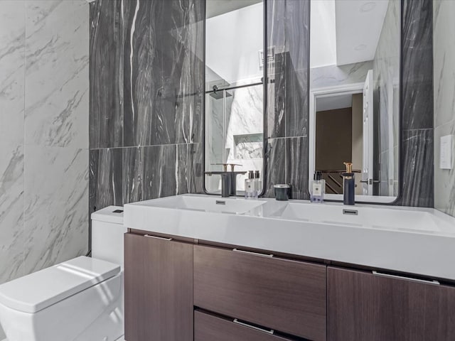 165-05 67th Ave, Fresh Meadows, NY 11365 - bathroom featuring tile walls, vanity, and a marble finish shower