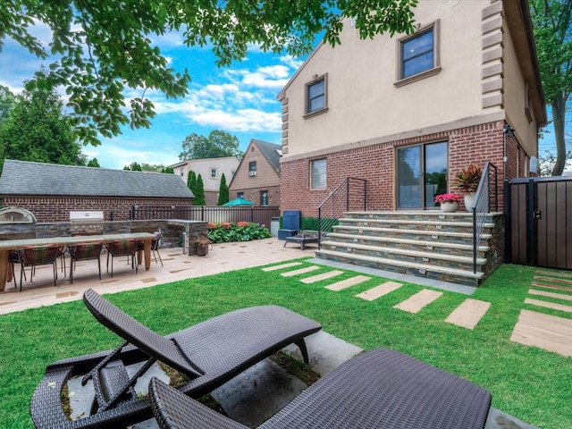 165-05 67th Ave, Fresh Meadows, NY 11365 - view of yard featuring a patio and outdoor dining space
