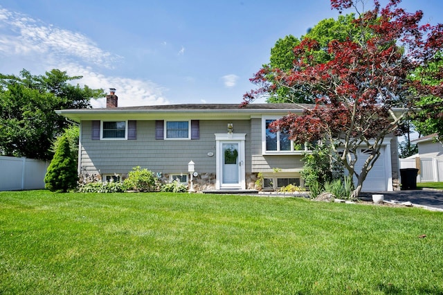 26 Comanche, Commack, NY 11725 - split foyer home featuring a chimney and driveway