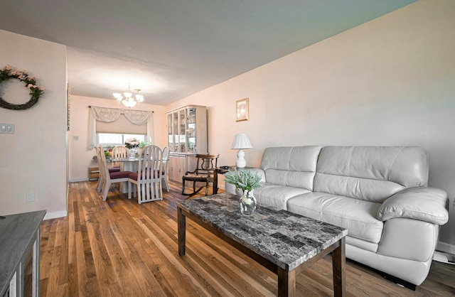 26 Comanche, Commack, NY 11725 - living room featuring a chandelier and wood finished floors
