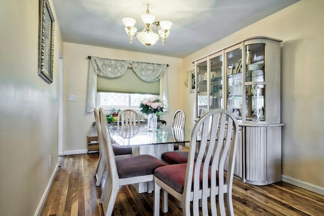 26 Comanche, Commack, NY 11725 - dining space featuring a chandelier and wood finished floors
