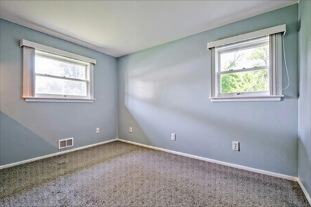 26 Comanche, Commack, NY 11725 - empty room with carpet and baseboards