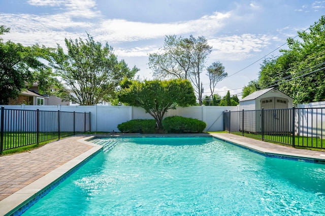 26 Comanche, Commack, NY 11725 - view of swimming pool featuring a fenced backyard, a patio, and a shed