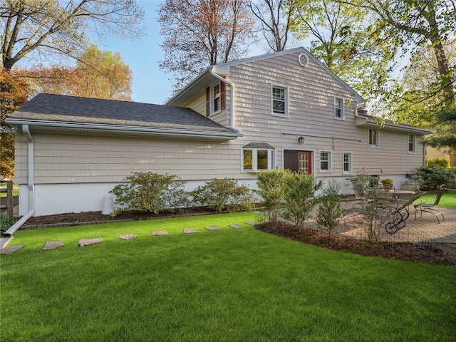 8 Dorset Rd, Call Listing Agent, CT 06851 - rear view of house with a lawn and a patio
