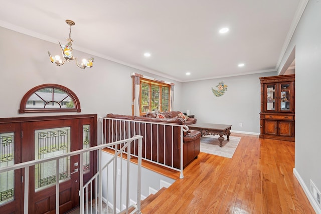 30 Birchwood Ter, Nanuet, NY 10954 - foyer with a chandelier, light wood-style floors, recessed lighting, and ornamental molding