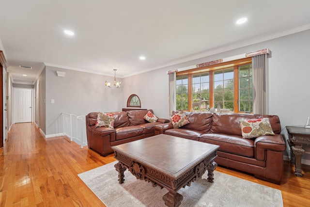 30 Birchwood Ter, Nanuet, NY 10954 - living room with crown molding, light wood-style floors, a chandelier, and recessed lighting