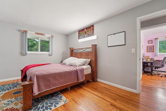 30 Birchwood Ter, Nanuet, NY 10954 - bedroom with light wood-style flooring and an office area