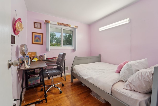30 Birchwood Ter, Nanuet, NY 10954 - bedroom featuring wood finished floors and an office area