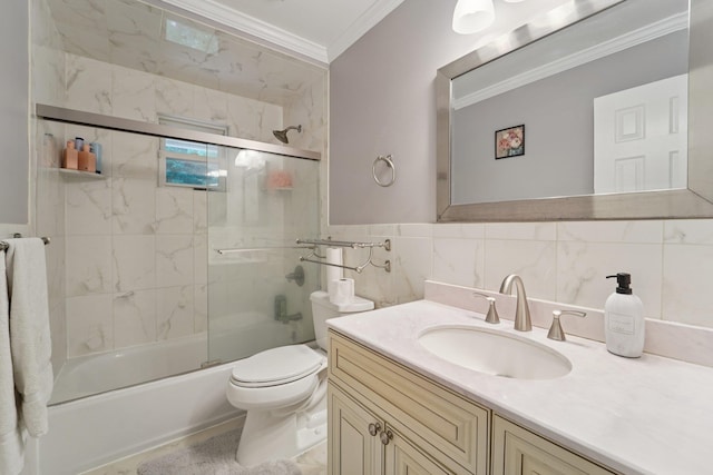 30 Birchwood Ter, Nanuet, NY 10954 - full bath with crown molding, vanity, enclosed tub / shower combo, tile walls, and wainscoting