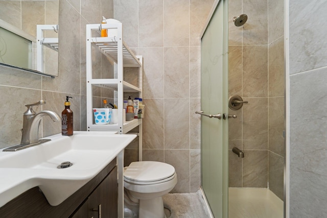 30 Birchwood Ter, Nanuet, NY 10954 - bathroom featuring tile walls, a shower stall, vanity, and decorative backsplash