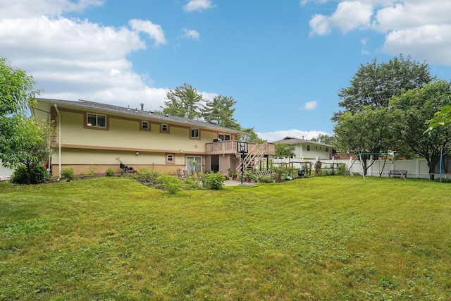 30 Birchwood Ter, Nanuet, NY 10954 - rear view of property featuring stairs, stucco siding, and a wooden deck
