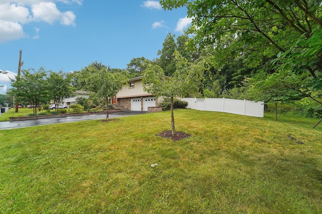 30 Birchwood Ter, Nanuet, NY 10954 - view of yard featuring a garage and driveway
