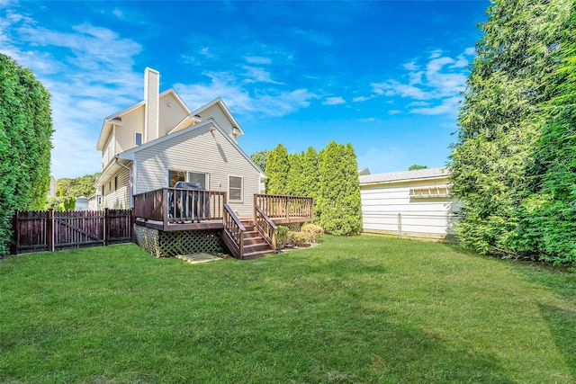 1025 Harrison Dr, Centerport, NY 11721 - back of house featuring a chimney and a deck