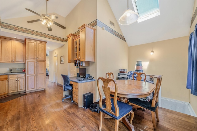 1025 Harrison Dr, Centerport, NY 11721 - dining area featuring high vaulted ceiling, wood finished floors, ceiling fan, and an office area