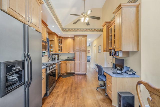 1025 Harrison Dr, Centerport, NY 11721 - kitchen with stainless steel appliances, a ceiling fan, light wood-style flooring, built in desk, and recessed lighting