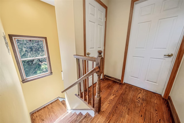 1025 Harrison Dr, Centerport, NY 11721 - stairway with wood finished floors and baseboards