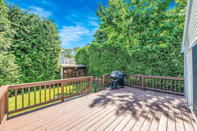 1025 Harrison Dr, Centerport, NY 11721 - wooden deck featuring a grill and a lawn