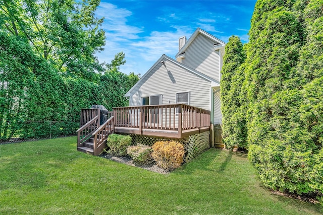 1025 Harrison Dr, Centerport, NY 11721 - back of house with a chimney and a wooden deck