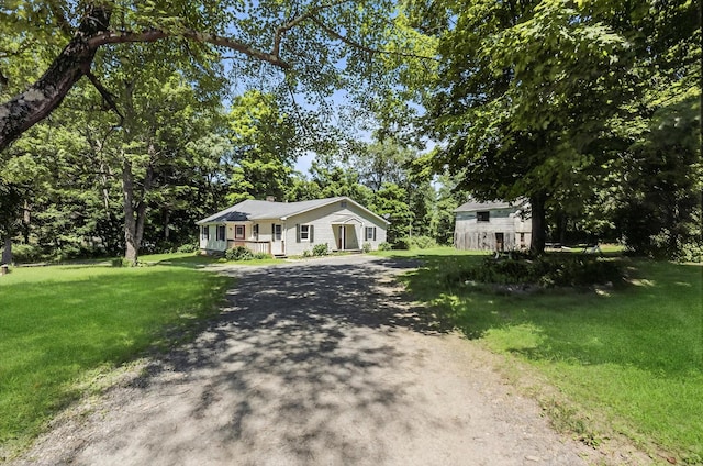11 Tribune Ln, Red Hook, NY 12571 - view of front of property featuring driveway and a front yard