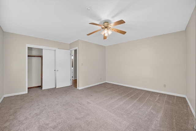 11 Tribune Ln, Red Hook, NY 12571 - unfurnished bedroom with carpet flooring, a closet, and a ceiling fan