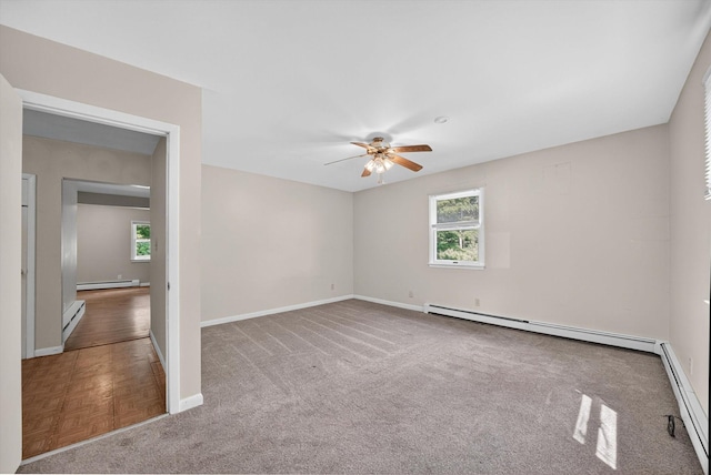 11 Tribune Ln, Red Hook, NY 12571 - carpeted empty room featuring a baseboard heating unit, a baseboard radiator, and ceiling fan