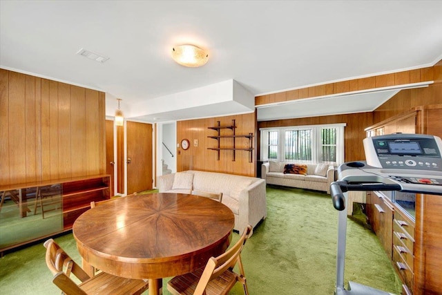 50 Chester Dr, Yonkers, NY 10710 - dining space with wooden walls, carpet floors, stairs, and ornamental molding