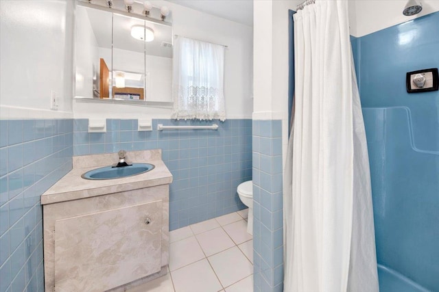 50 Chester Dr, Yonkers, NY 10710 - bathroom featuring tile walls, vanity, tile patterned flooring, a wainscoted wall, and a shower with shower curtain