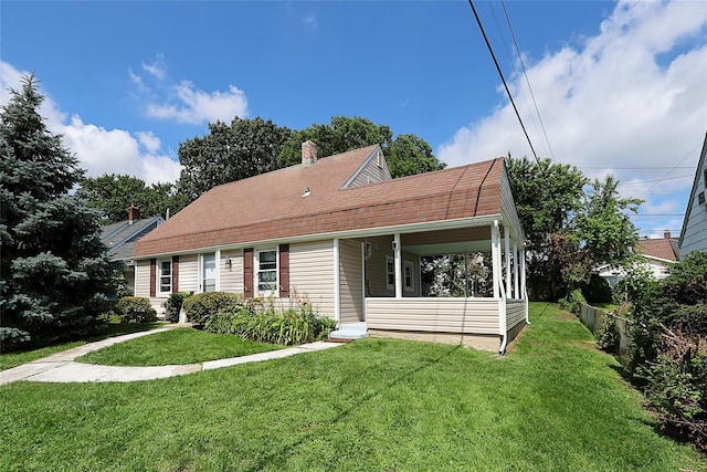 16 Primrose Ln, Levittown, NY 11756 - view of front of property featuring a chimney