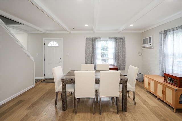 16 Primrose Ln, Levittown, NY 11756 - dining room featuring a wall unit AC, beamed ceiling, light wood-type flooring, and recessed lighting