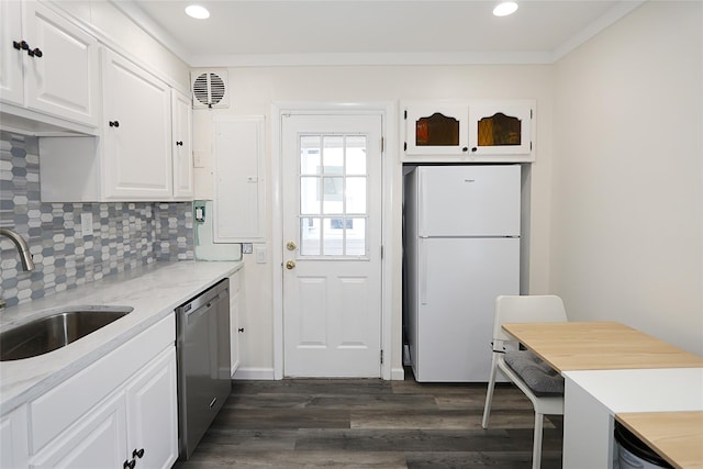16 Primrose Ln, Levittown, NY 11756 - kitchen with freestanding refrigerator, stainless steel dishwasher, dark wood-type flooring, white cabinets, and backsplash