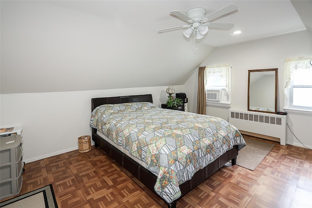 16 Primrose Ln, Levittown, NY 11756 - bedroom with radiator heating unit, vaulted ceiling, multiple windows, cooling unit, and recessed lighting