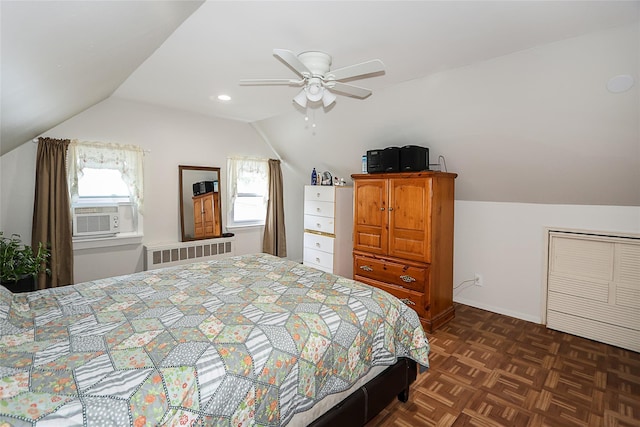 16 Primrose Ln, Levittown, NY 11756 - bedroom with radiator, vaulted ceiling, cooling unit, and ceiling fan