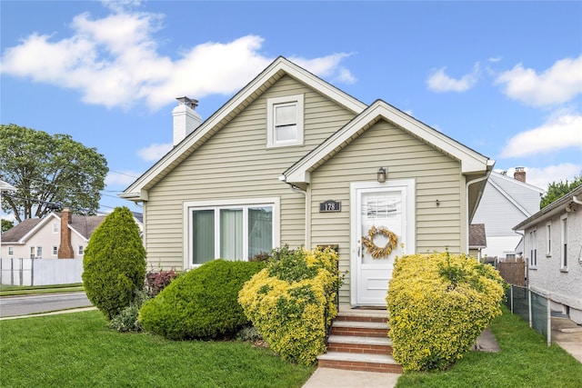 178 Charles St, Lynbrook, NY 11563 - bungalow with a chimney