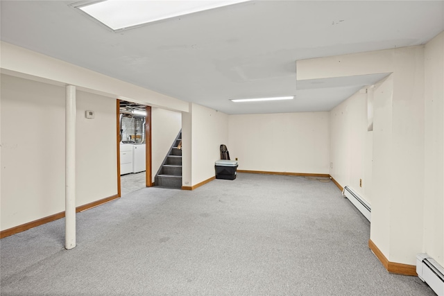 178 Charles St, Lynbrook, NY 11563 - finished below grade area featuring a baseboard radiator, stairs, and light carpet