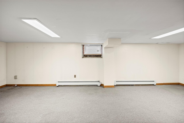 178 Charles St, Lynbrook, NY 11563 - finished below grade area featuring a baseboard radiator and carpet floors