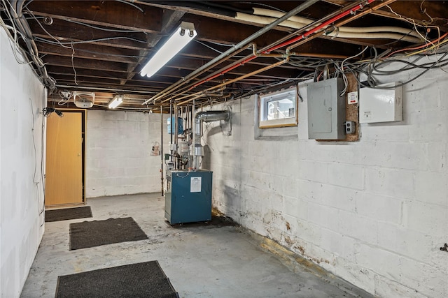 178 Charles St, Lynbrook, NY 11563 - below grade area with electric panel and a heating unit