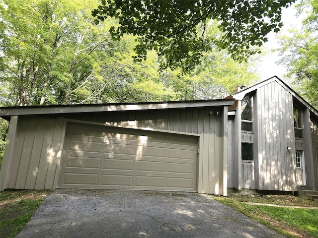 2 Redmond Way, Stanfordville, NY 12581 - view of front of house featuring a detached garage and a chimney