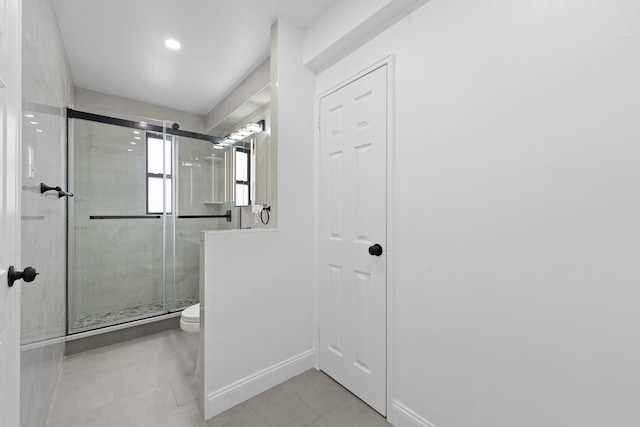 37-56 87th St Unit 3C, Jackson Heights, NY 11372 - bathroom featuring a stall shower and tile patterned floors