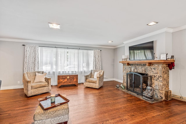 21 Orchard St, Glen Head, NY 11545 - living area with wood finished floors, ornamental molding, and a stone fireplace