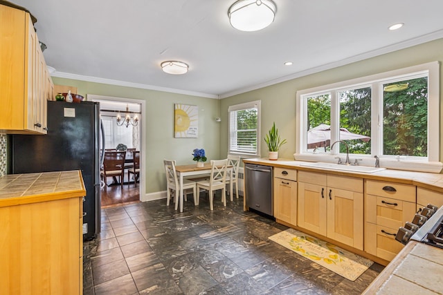 21 Orchard St, Glen Head, NY 11545 - kitchen with stainless steel dishwasher, tile countertops, ornamental molding, a chandelier, and freestanding refrigerator