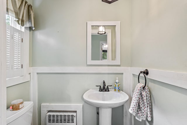 21 Orchard St, Glen Head, NY 11545 - bathroom with toilet and heating unit