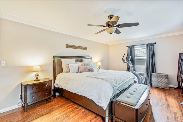 21 Orchard St, Glen Head, NY 11545 - bedroom with wood finished floors, crown molding, and a ceiling fan